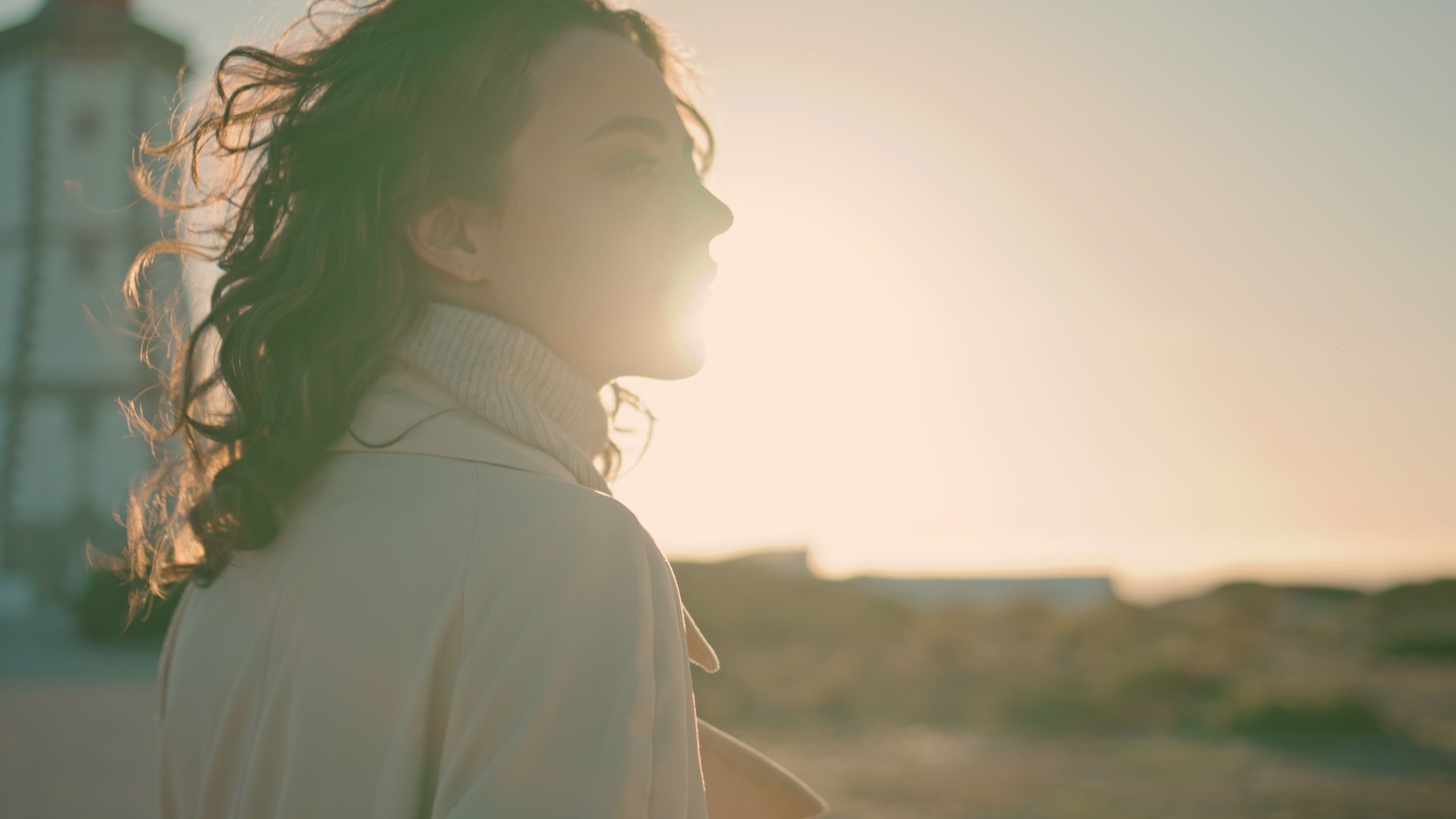 Closeup casual girl walking in sun. Stylish beautiful woman enjoying evening Closeup casual girl walking in sun. Stylish beautiful woman enjoying evening